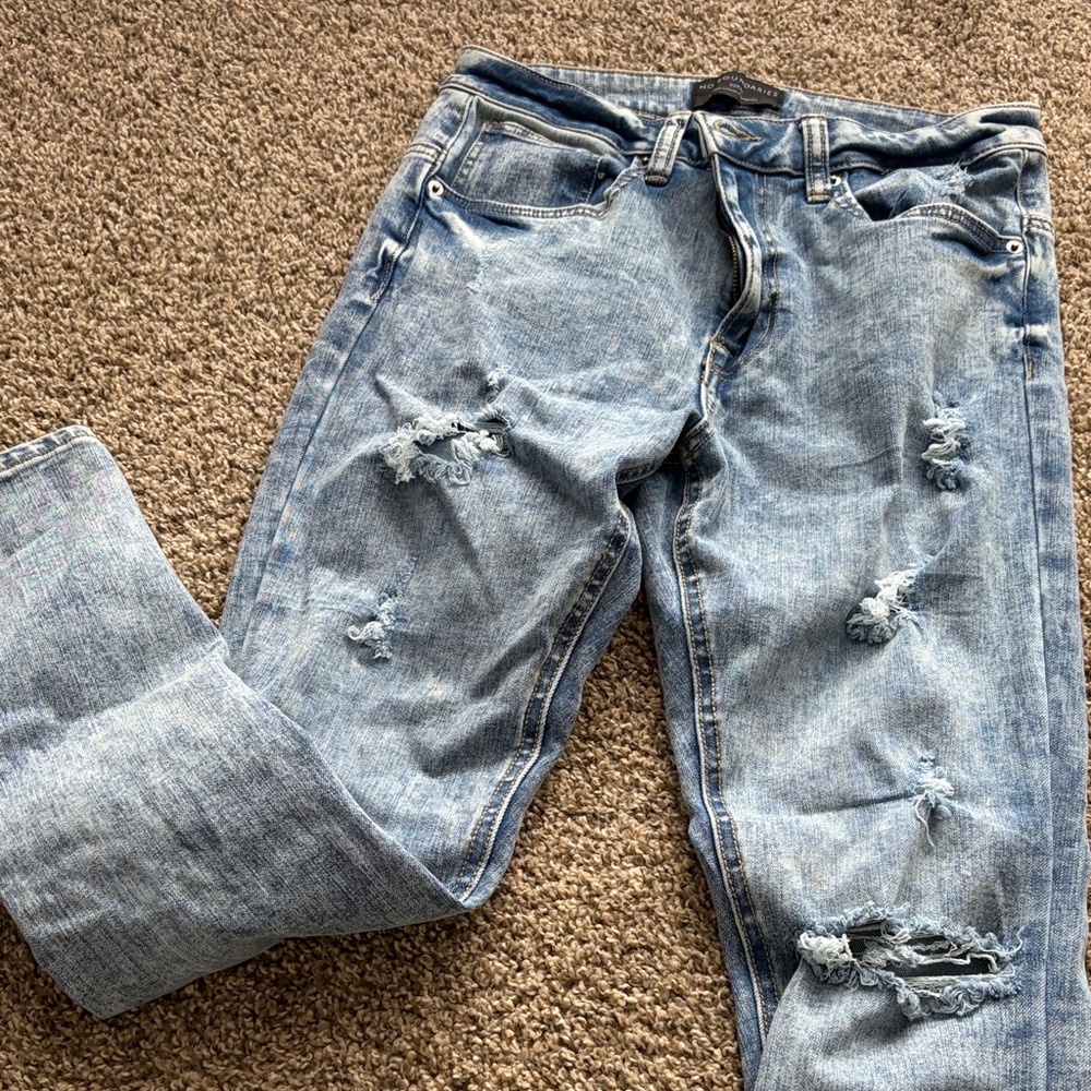 Distressed Light Blue Jeans